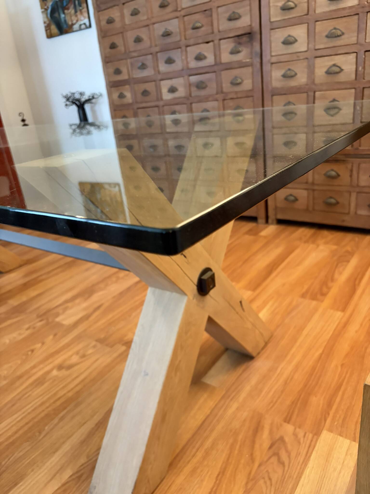 Rectangular dining table with glass top from Roche Bobois.