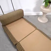 Vintage pull-out sofa bed, brown checked lounge chair with chrome.