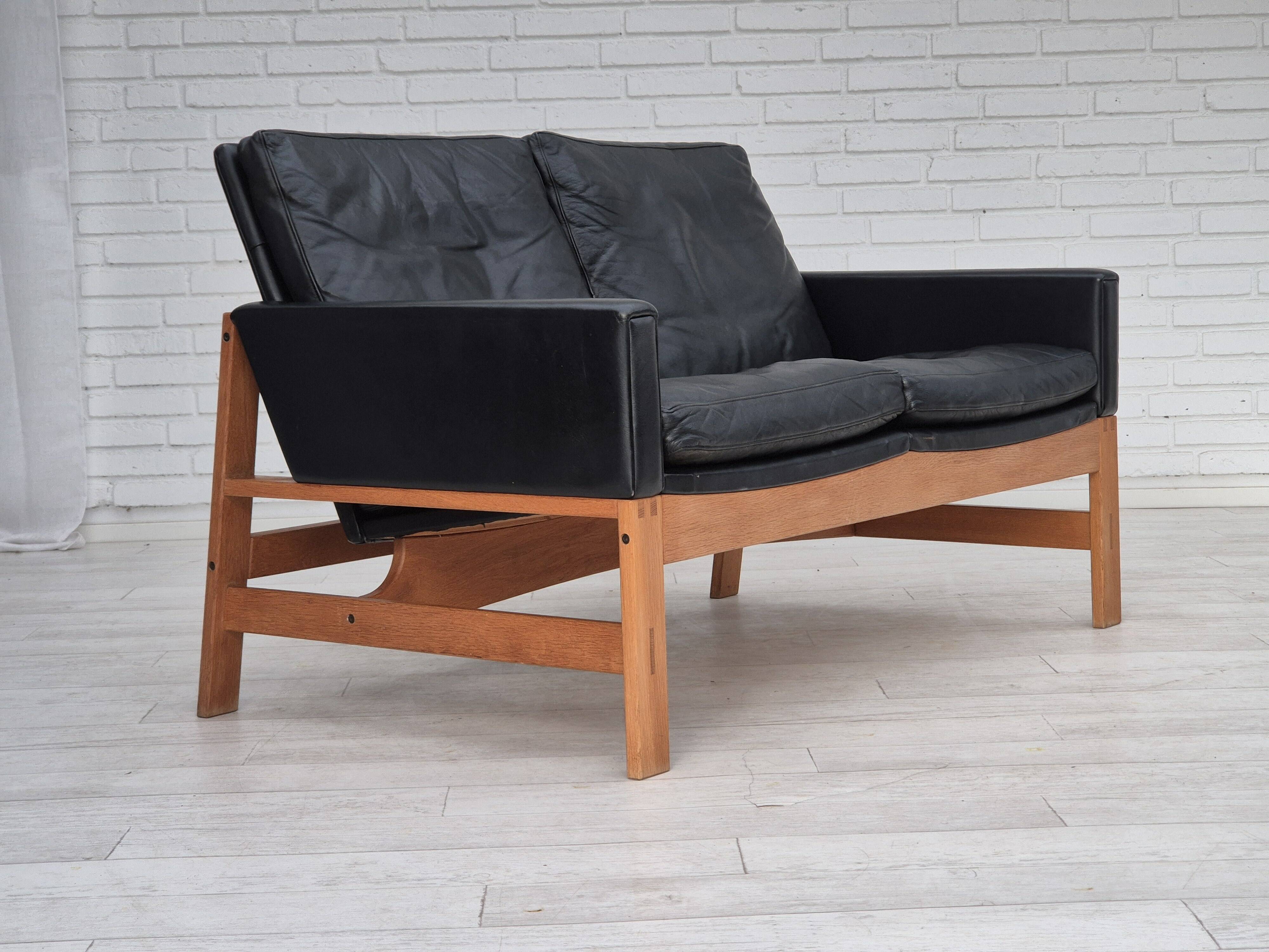 1960s, Danish 2-seater sofa in original condition, furniture leather, solid oak wood.