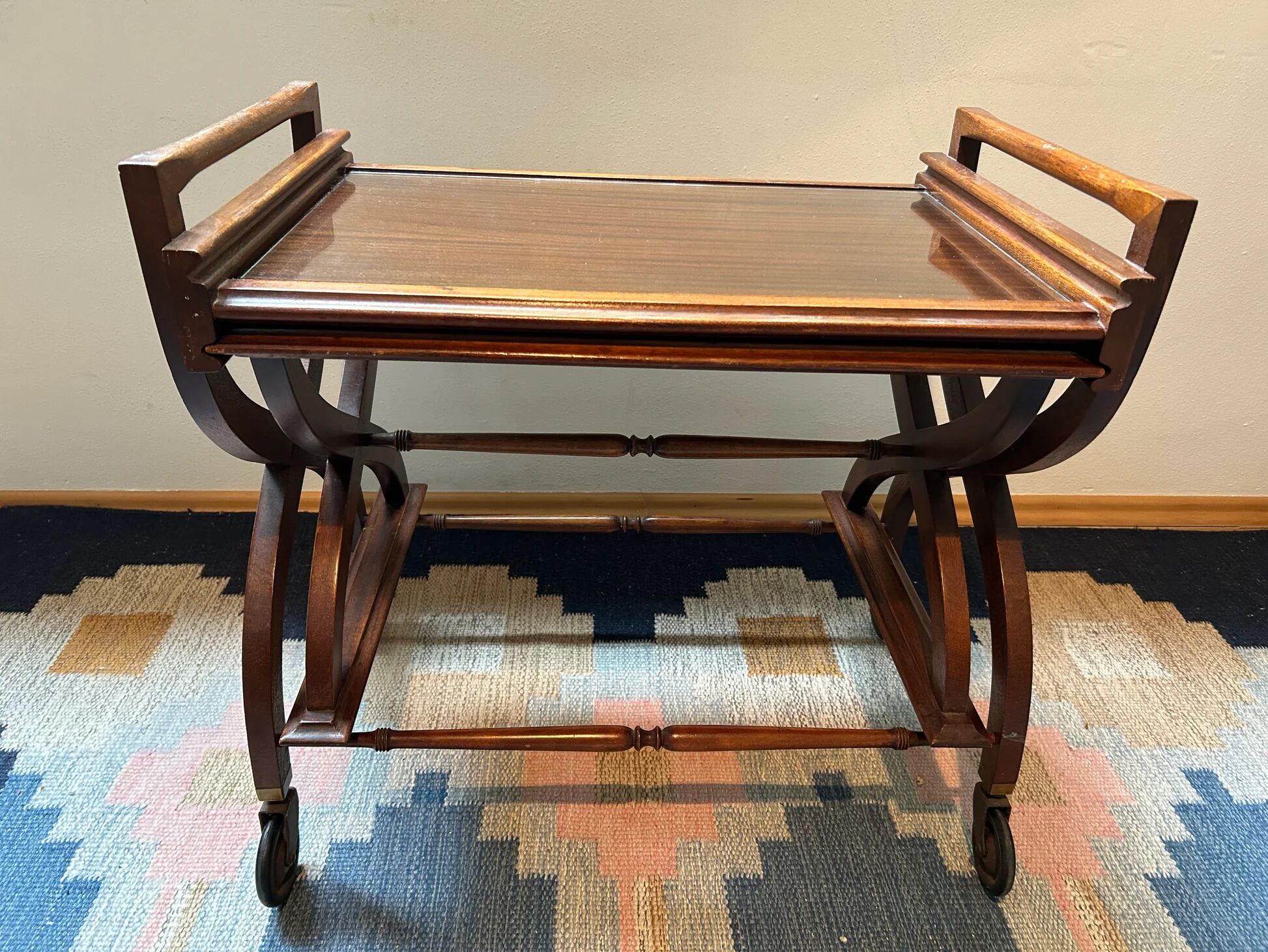 Teak service trolley with nesting table, mid-century modernism.