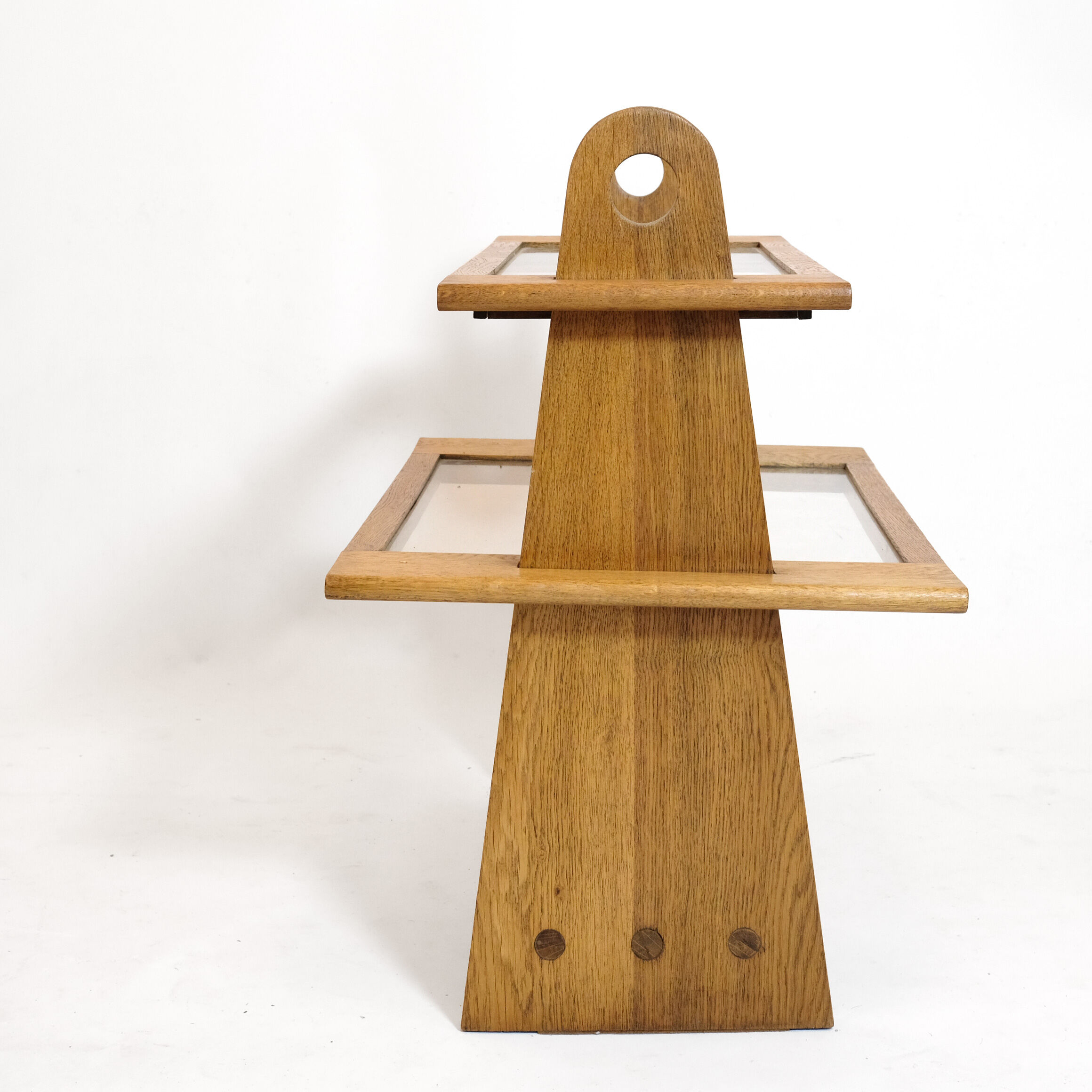 Served in oak and glass from the 50s and 60s.