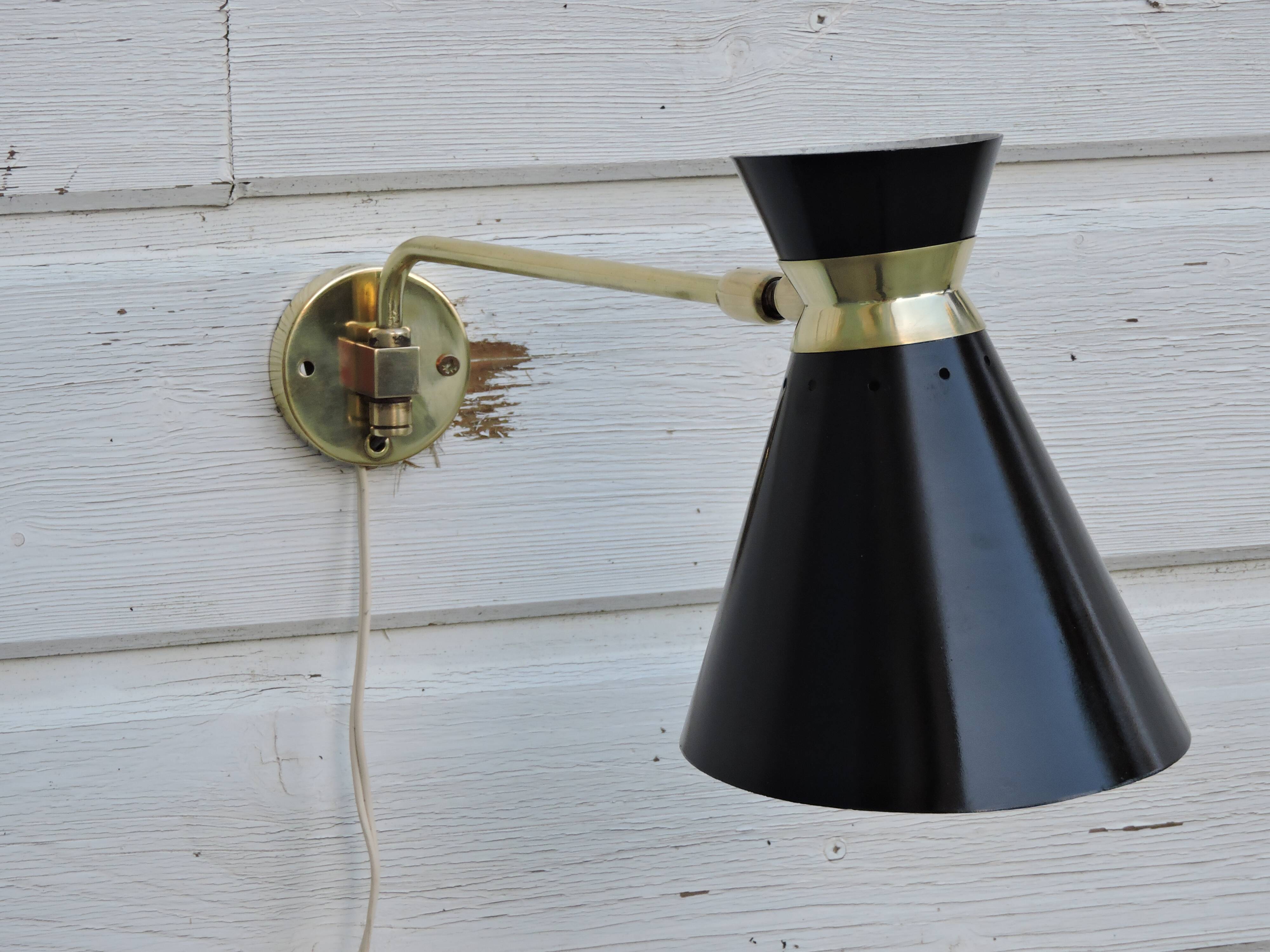 Adjustable stem wall lamp with ball head, diabolo lampshade
