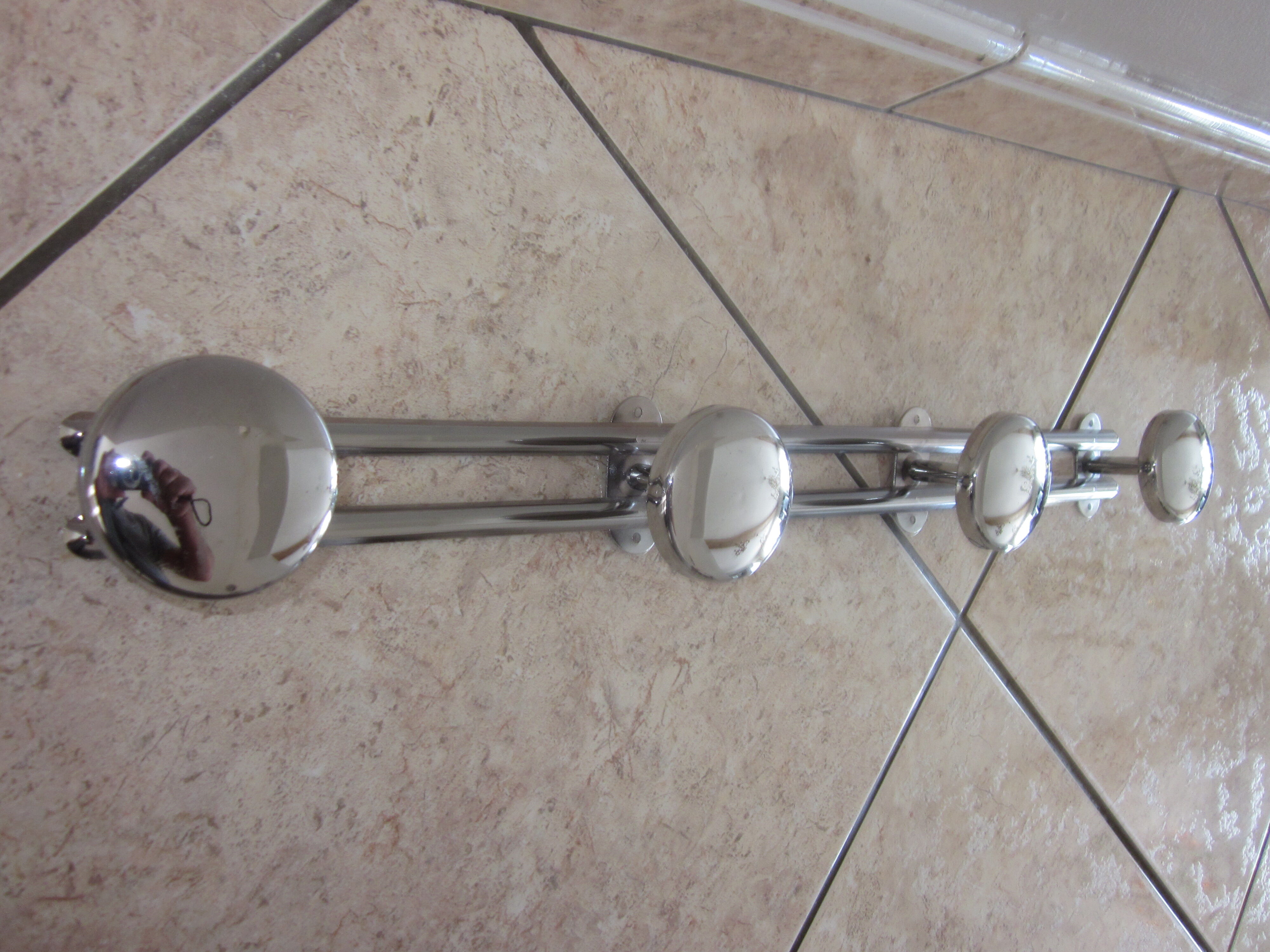 Old chrome coat rack