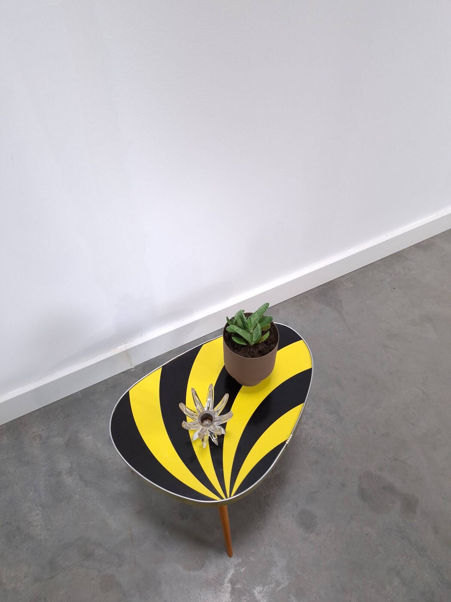 Vintage 1950s black and yellow striped formica table, plant table.