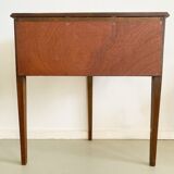 Old mahogany half-moon table with side shutters.