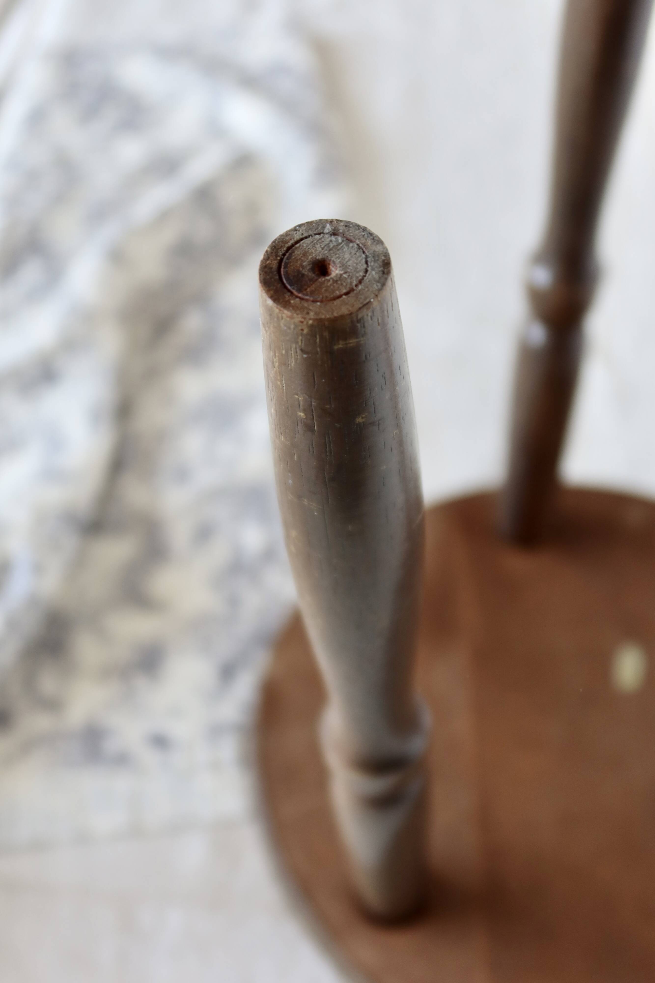 Antique tripod stool in turned wood
