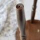 Antique tripod stool in turned wood