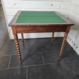 Old mahogany game table
