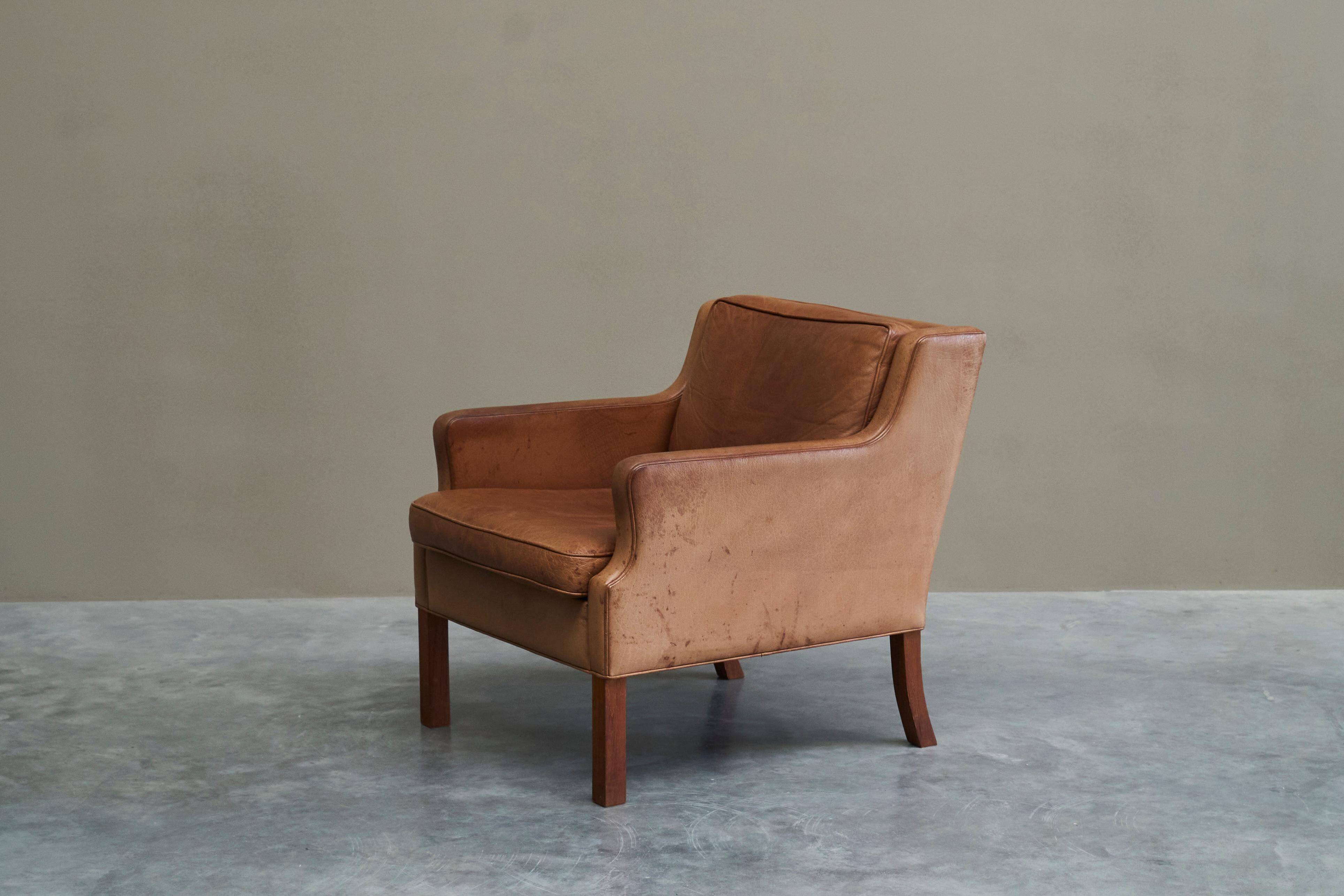 1970s patinated leather Scandinavian lounge chair