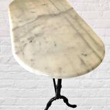 Oval marble and cast iron bistro table