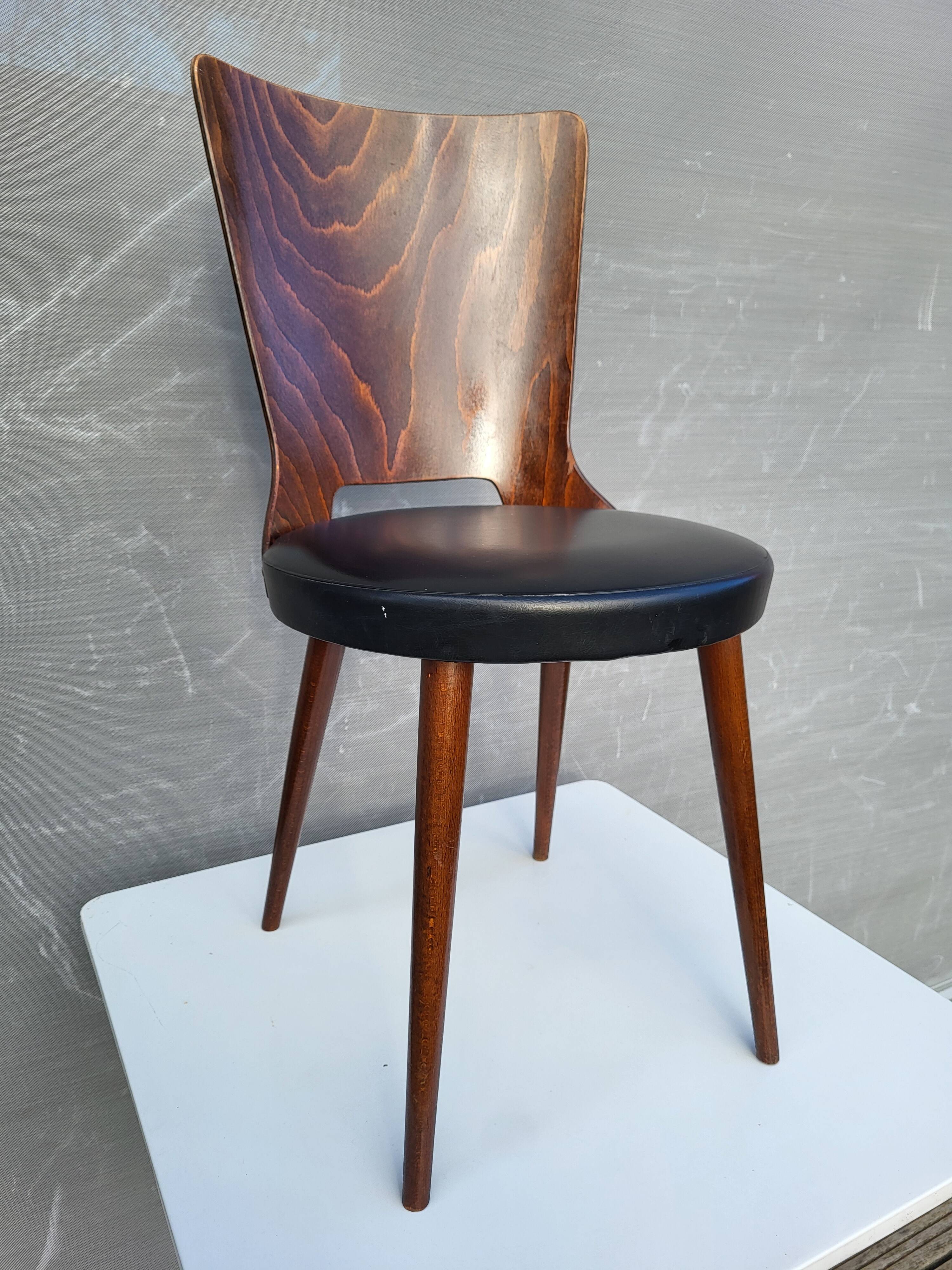 Pair of Dove chairs • Baumann • Black faux leather