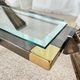 Vintage Italian coffee table in glass, chrome and brass metal, Hollywood Regency style, 1970s.