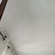 Vintage bevelled wall mirror in stained wood and brass