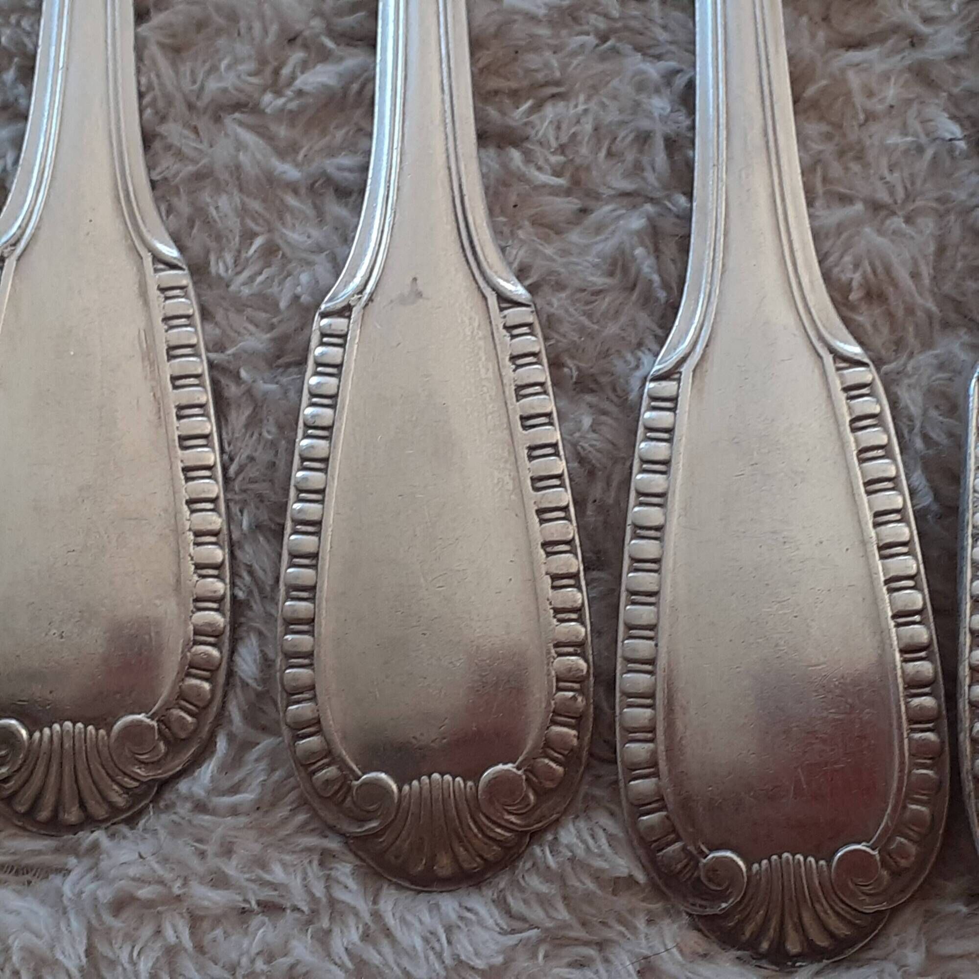 Lot de 12 fourchettes en métal argenté