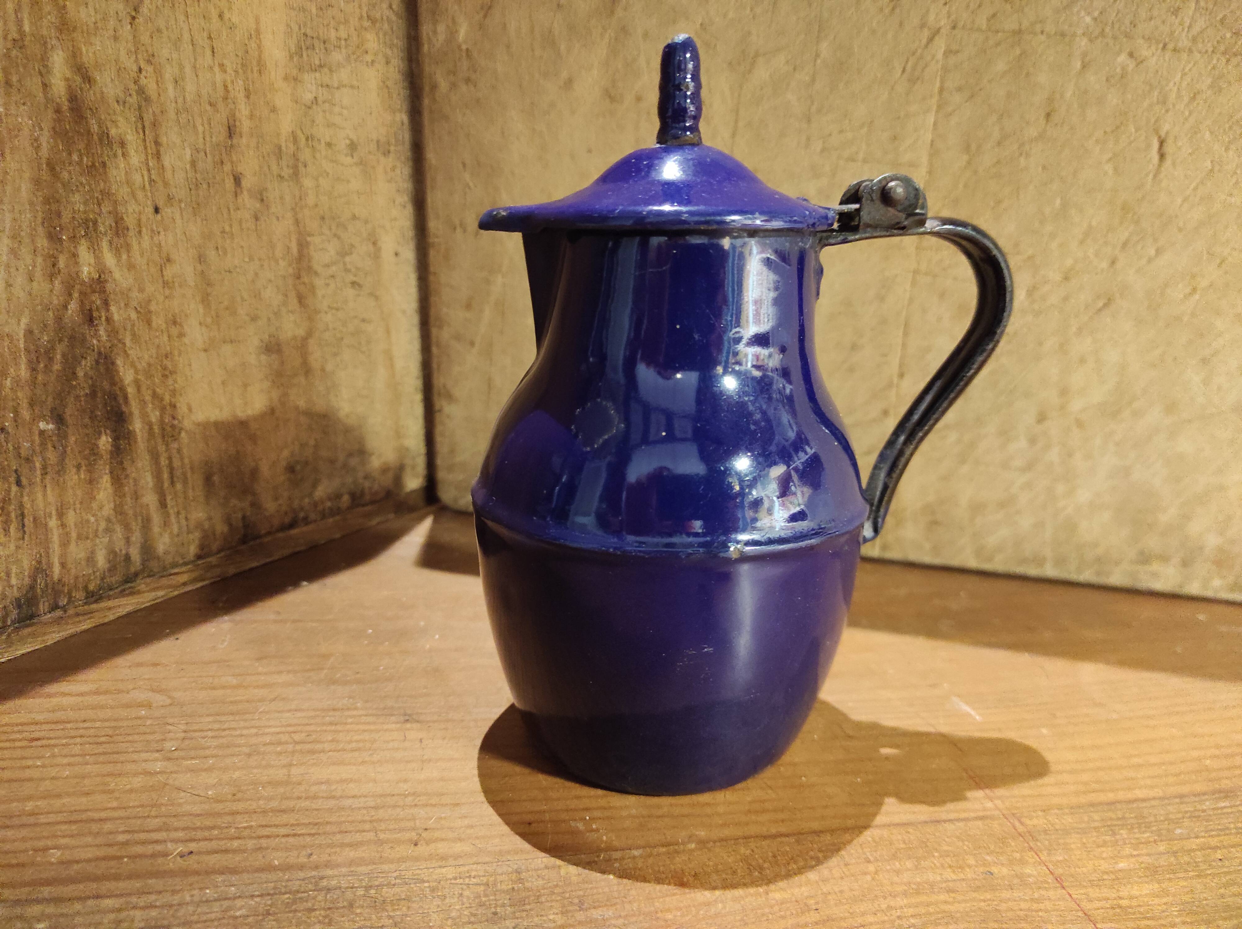 Small vintage French jug with lid, in blue enamel