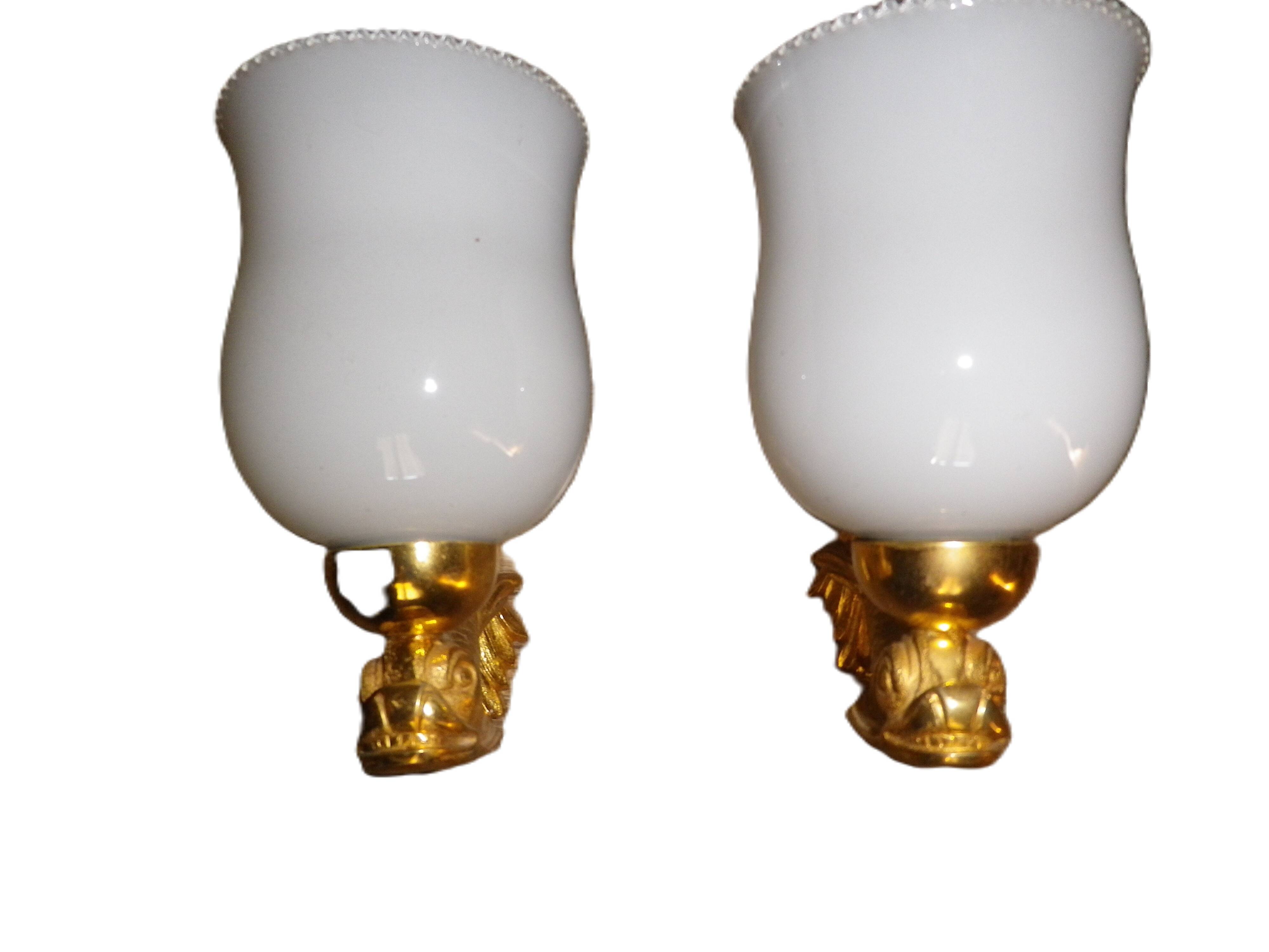 chandelier and its golden bronze brass wall lights