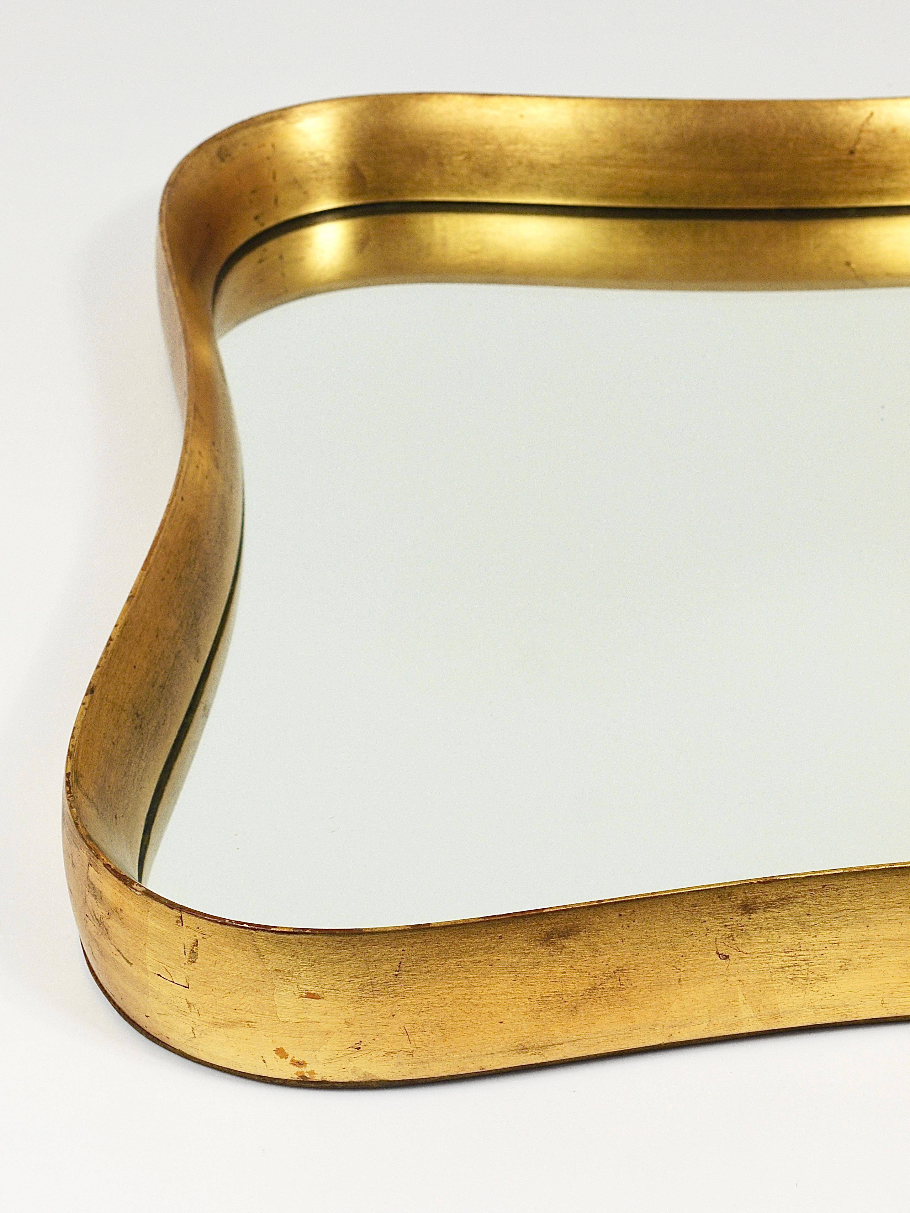 Golden wooden mirror in the style of Gio Ponti by Max Welz, Vienna, Austria, 1940s.