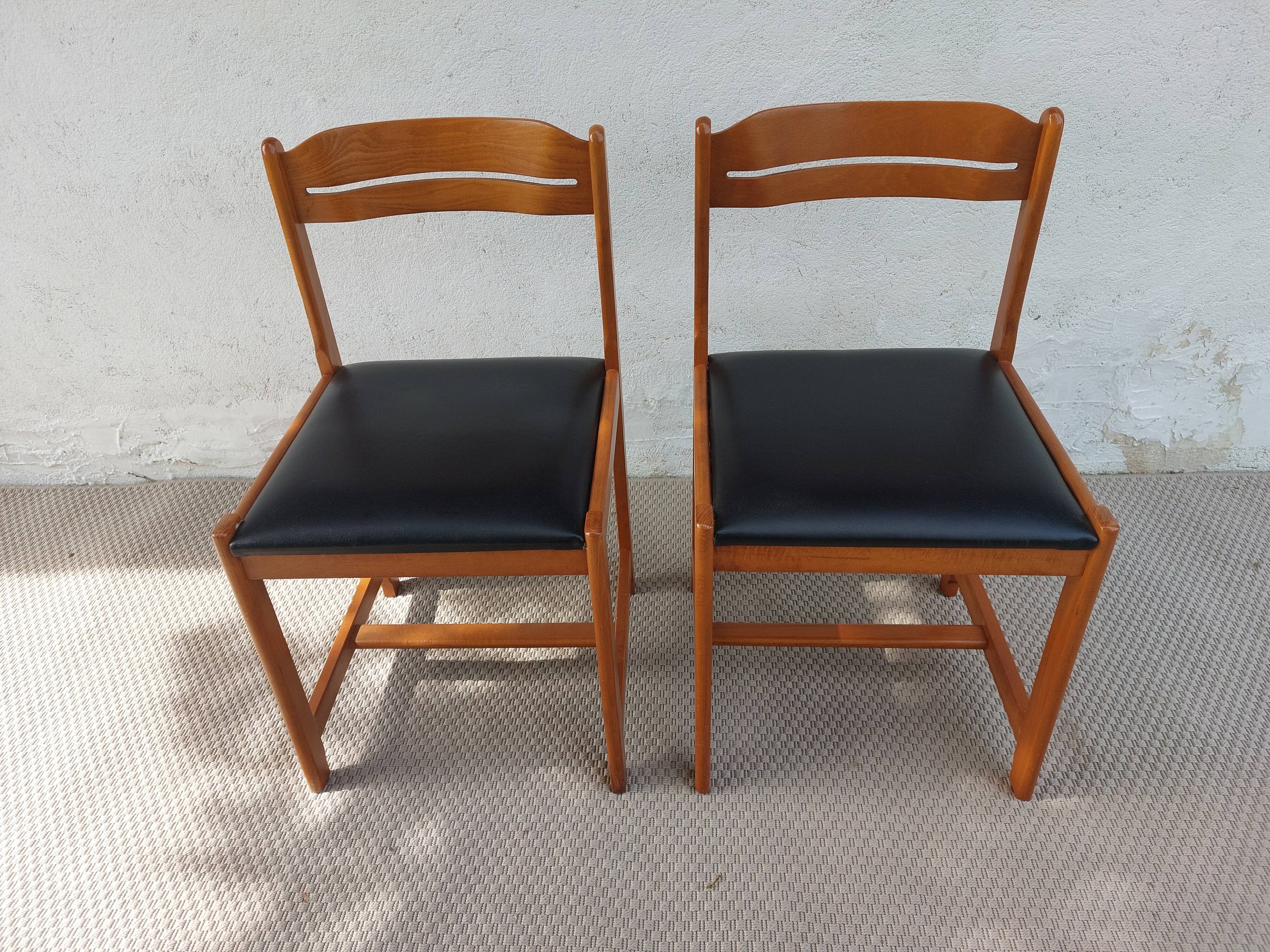paire de chaises style scandinave, simili cuir noir