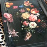 Black tray with floral motifs