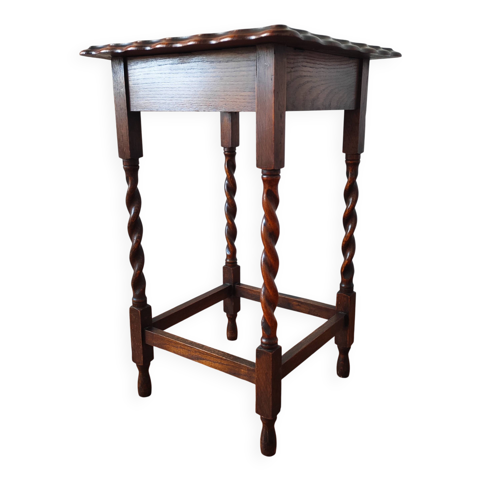 Antique solid oak side table with turned wooden legs.