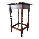 Antique solid oak side table with turned wooden legs.