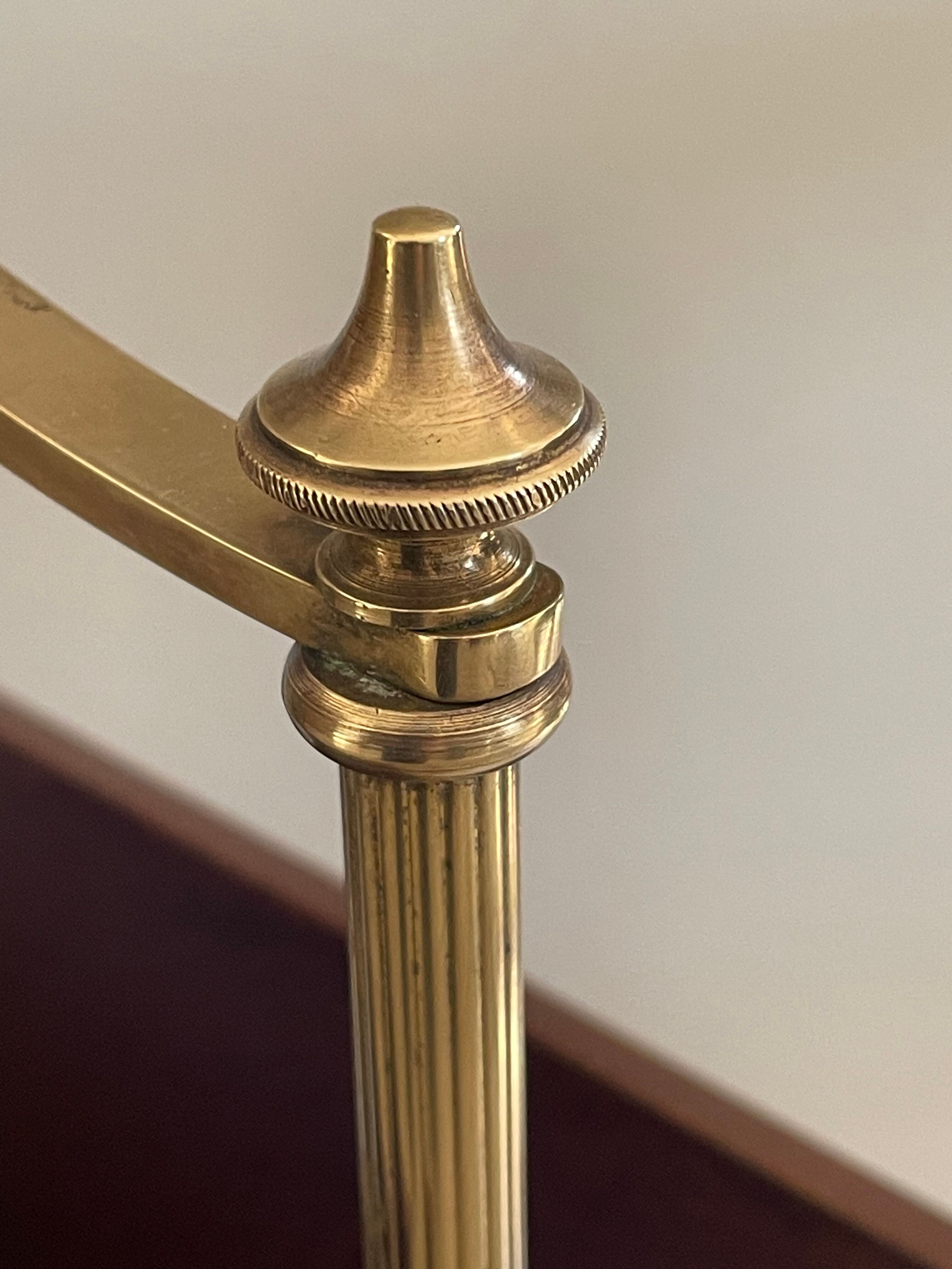 Magazine racks with claw feet by Maison Jansen