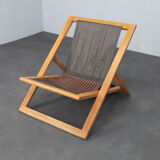 Modernist folding lounge chair with wooden frame, 1970s