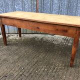 Antique solid cherry farmhouse table with 2 front drawers.