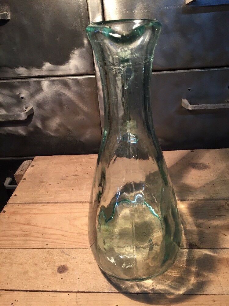 Bluish green glass decanter