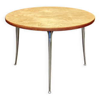 High table in solid raw wood and cast aluminum.