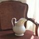 Antique white porcelain jug from the 19th century
