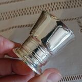 Egg cup and spoon in silver metal