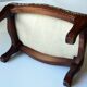 Small foot stool made of wood with upholstery, vintage from the 70s