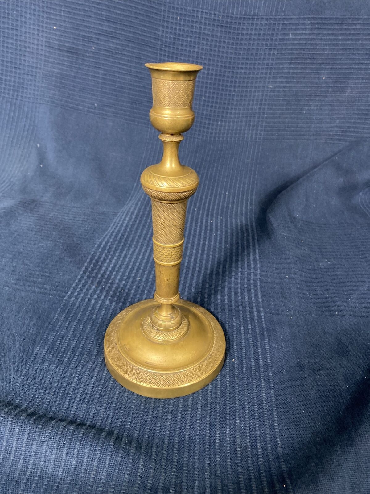 Old Louis-style brass candlestick