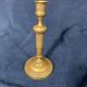 Old Louis-style brass candlestick