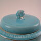 Turquoise blue earthenware candy box decorating stylized frieze fish Art Deco