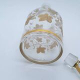 Old crystal carafe with golden decoration