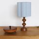 Table lamp, turned wooden base from the 1960s and sky blue gingham shade.