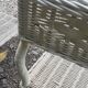 Pairs of white rattan side tables and smoked glass