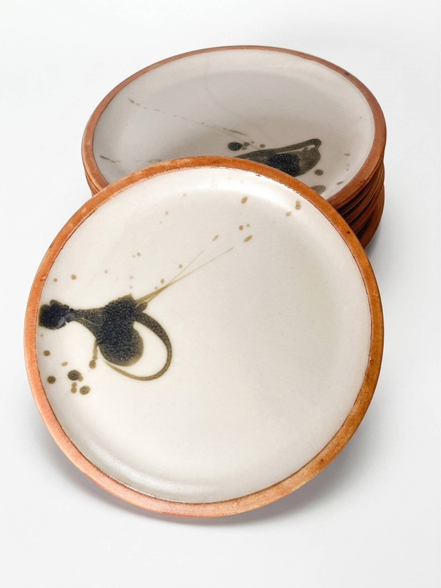 8 pottery plates from La Colombe