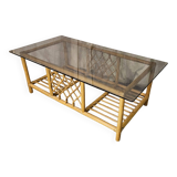 Table basse en rotin dessus verre fumé 1970
