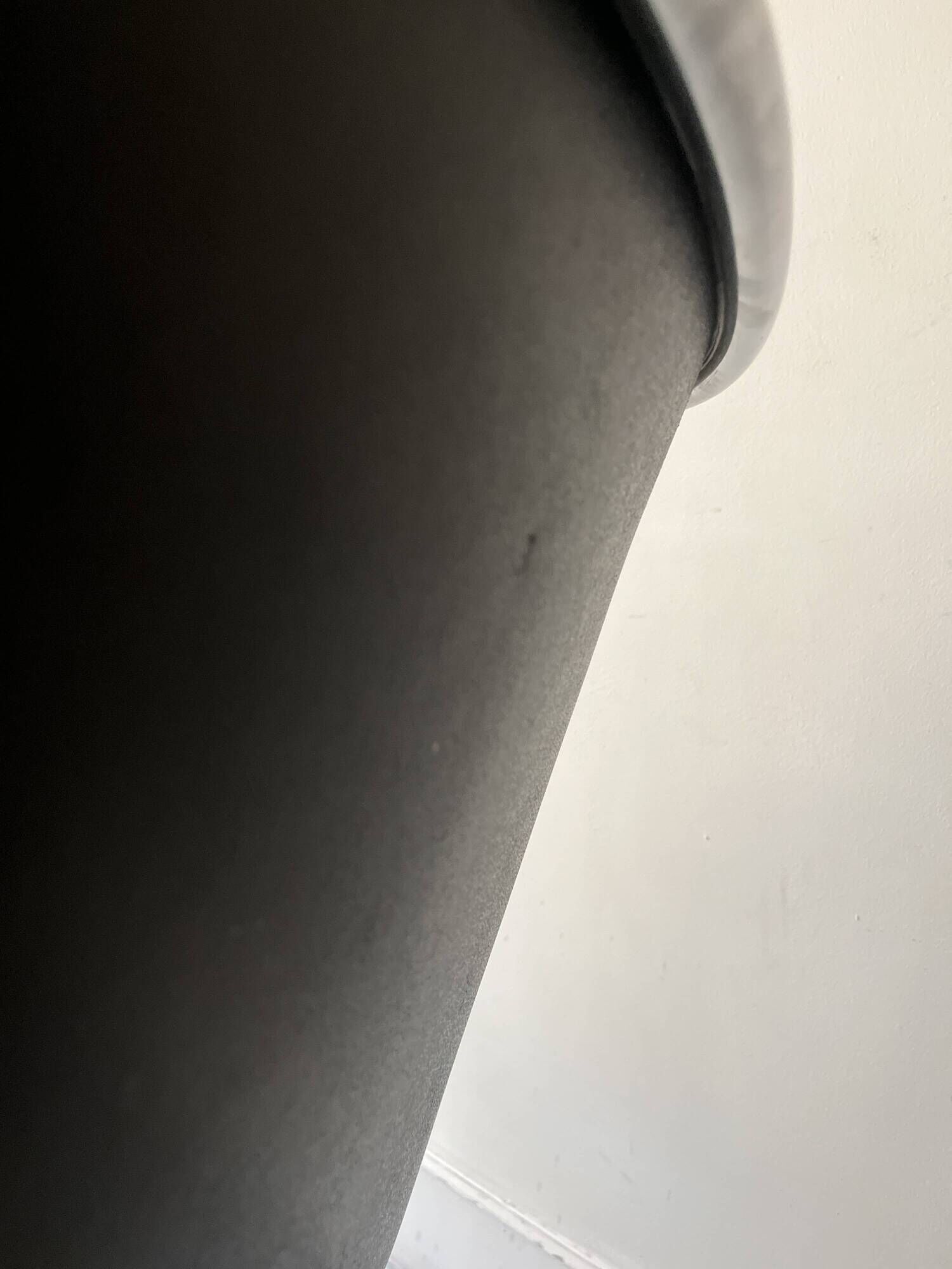 Black leather office chair and armrest by Charles Pollock for Knoll International
