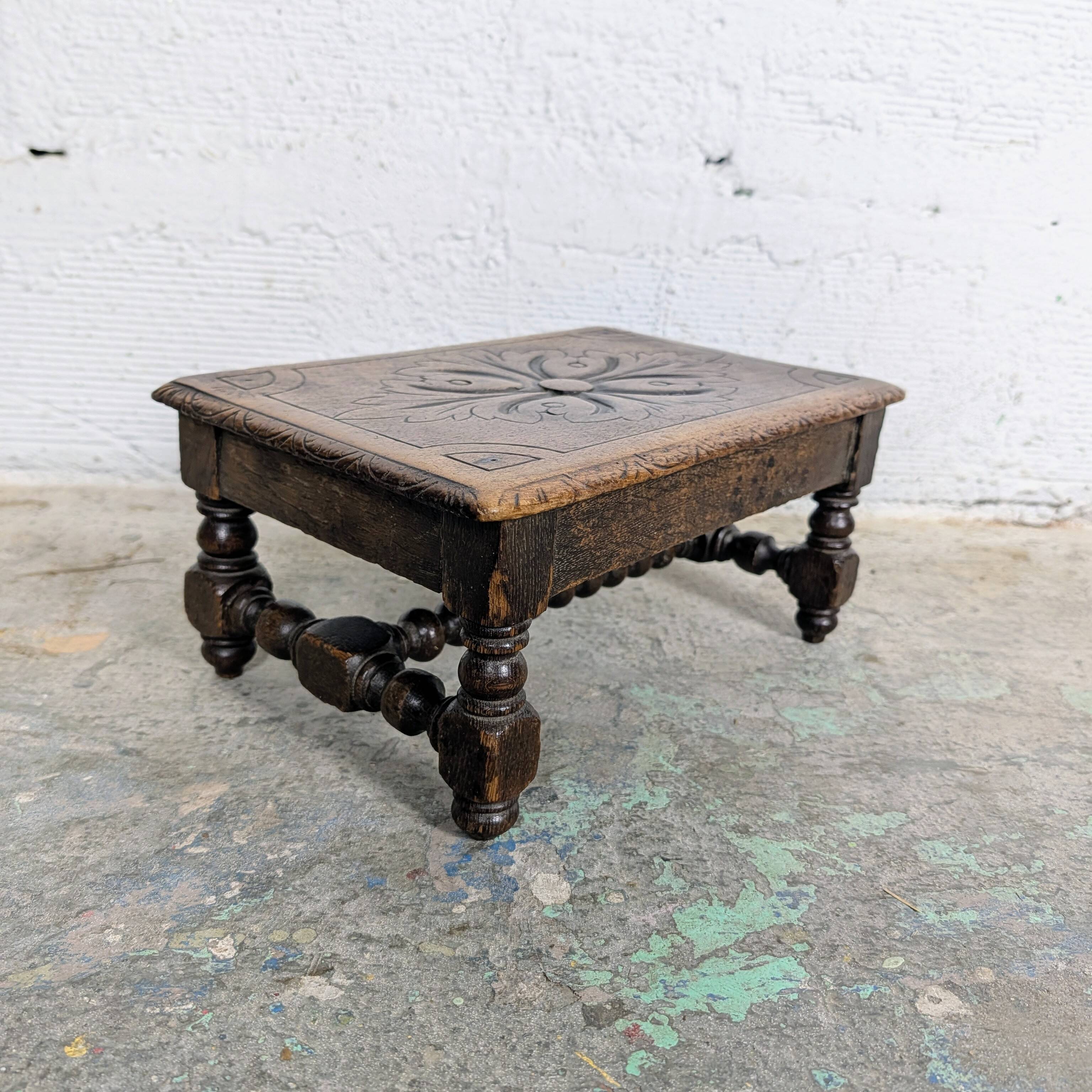 Carved wooden footrest