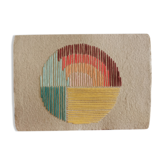 Rainbow embroidery on rag paper