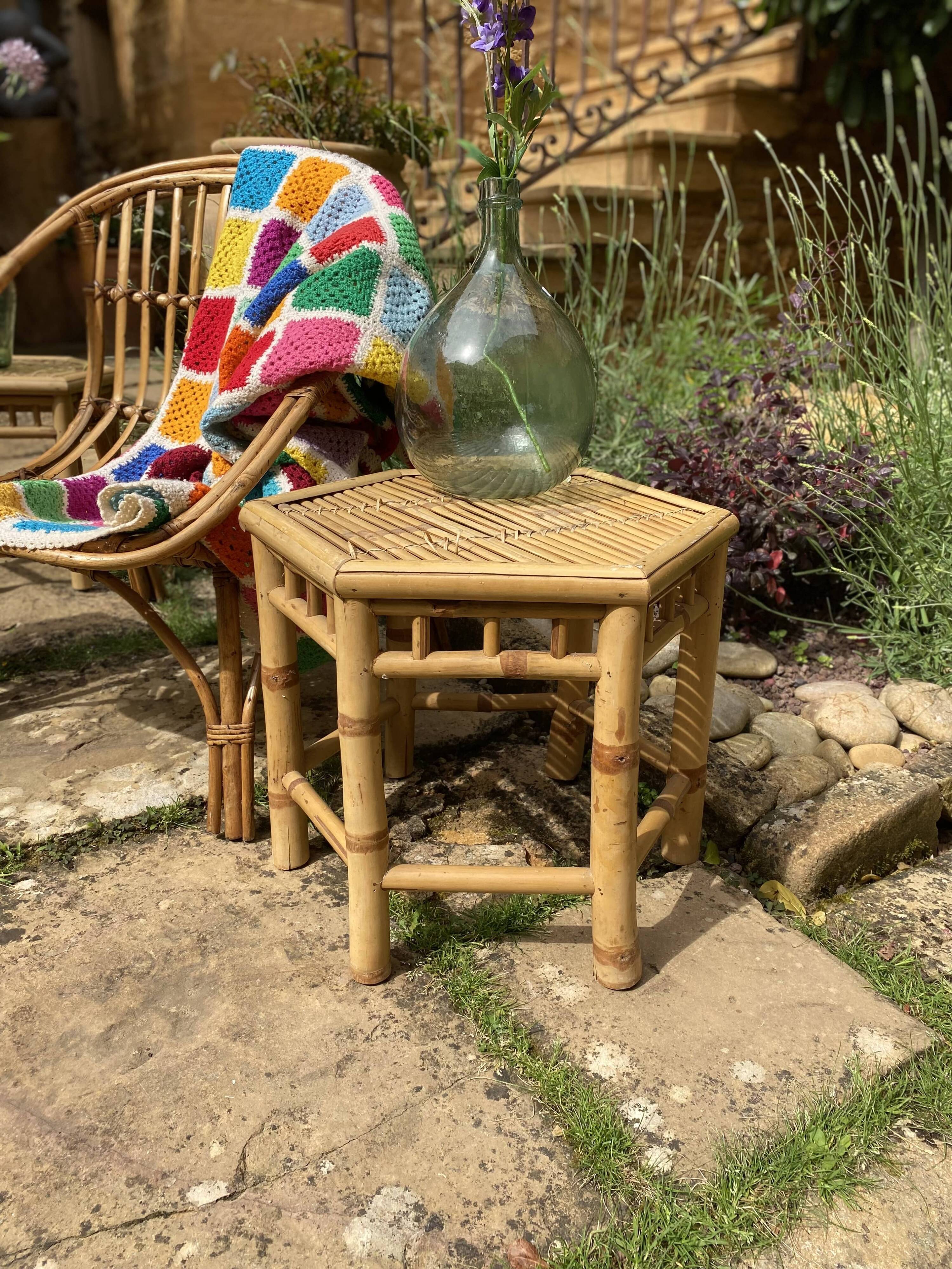 Set of three vintage rattan side tables.
