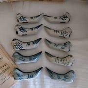Ceramic knife rest in the shape of birds.