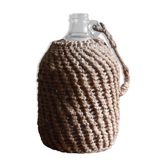 Demijohn covered in braided rope