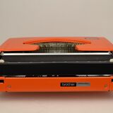 Typewriter Brother 210 orange 1970s