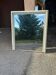 Wooden mirror with off-white stucco