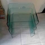 Suite of 3 nesting tables in curved glass from the 80s.